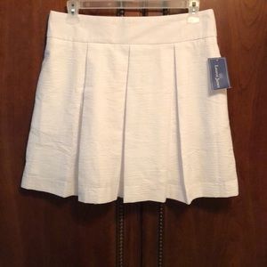 White skirt above the knee